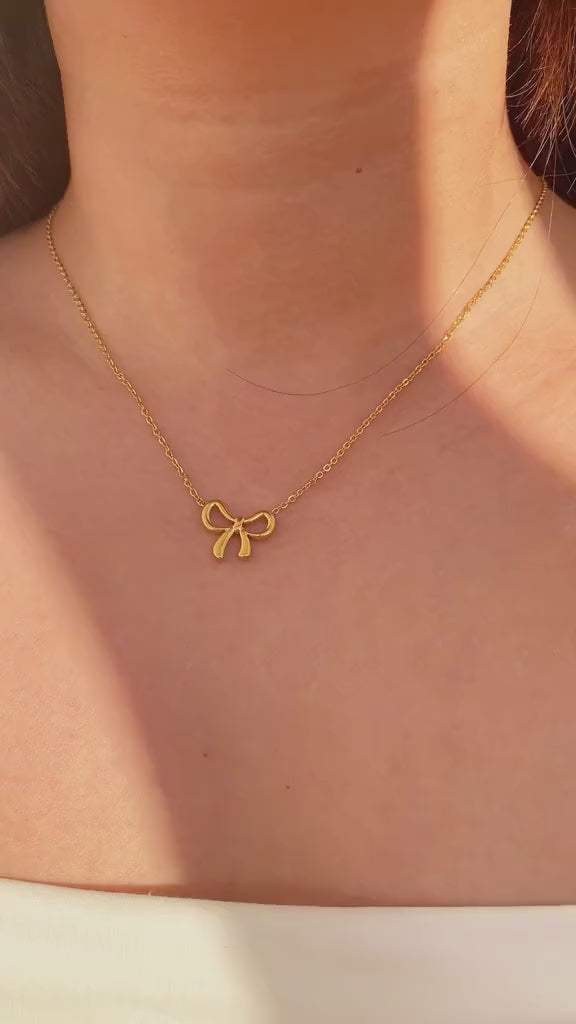 Golden Bow Pendant Necklace